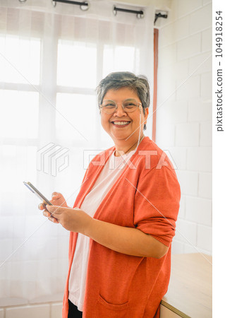 Happy senior who radiates happiness and laughter, living a carefree life. Happy senior who radiates happiness and laughter, living a carefree life. 104918254
