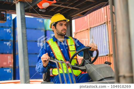 Industrial warehouse foreman working at overseas shipping container yard 104918269