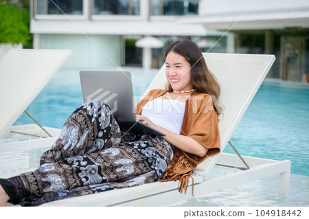 Smiling portrait of businesswoman working outdoor office Smiling portrait of businesswoman working outdoor office 104918442