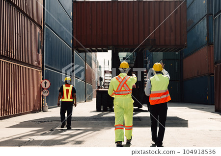Warehouse engineer worker working at industrial container yard 104918536