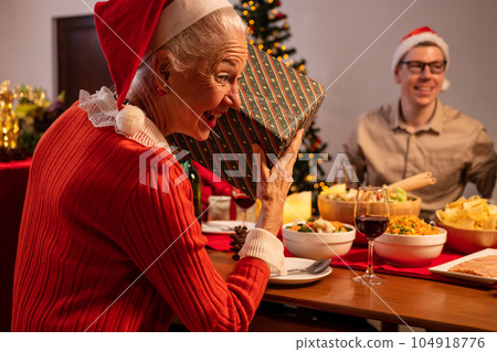 Happy family enjoying with Christmas celebration at home 104918776