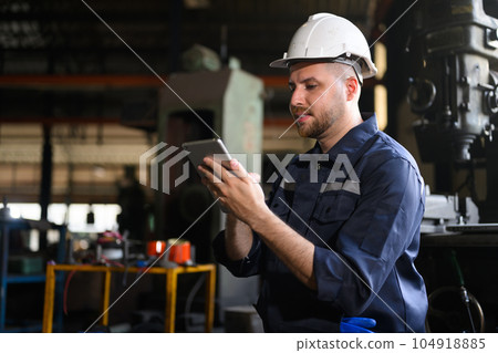 Maintenance engineer worker working at manufacturing plant factory 104918885