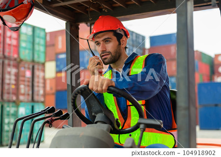 Warehouse engineer worker working at industrial container yard Warehouse engineer worker working at industrial container yard 104918902