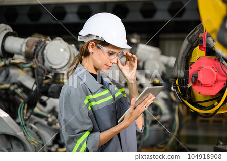 Maintenance engineer worker working with robotic machine automation 104918908