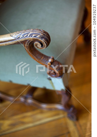 Close up of a beautiful old armchair in a castle 104919237