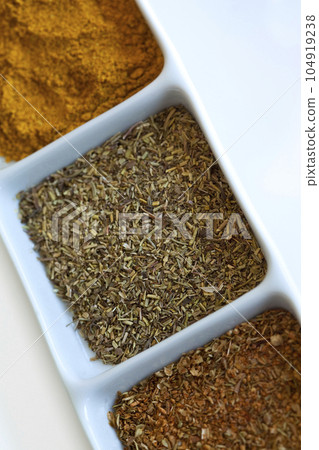 Cook ingredients in a porcelain dish 104919238