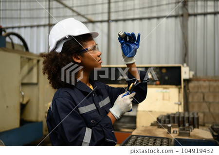 Engineer technician controlling robotic arms on computer laptop Engineer technician controlling robotic arms on computer laptop 104919432