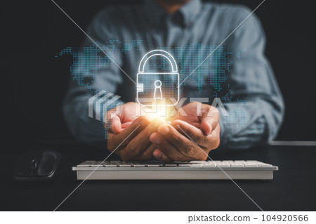 Businessman holds shield protect icon on palm, emphasizing the concept of protection network security and safe data. Lock symbol represents cybersecurity and safeguarding against cyber threats. Businessman holds shield protect icon on palm, emphasizing the concept of protection network security and safe data. Lock symbol represents cybersecurity and safeguarding against cyber threats. 104920566