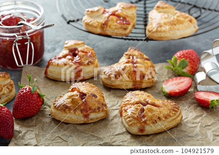 Strawberry hand pies heart shaped 104921579