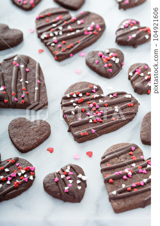 Chocolate hearts cookies for Valentines day Chocolate hearts cookies for Valentines day 104921606