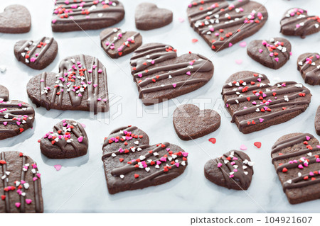 Chocolate hearts cookies for Valentines day Chocolate hearts cookies for Valentines day 104921607