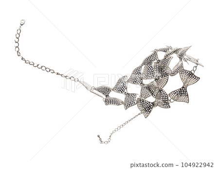 Silver stainless bead style necklet fly in air. Silver metal necklace as gemstone for fashion ornament decorative items. Fashion ornament necklace to add more style. White background isolated 104922942