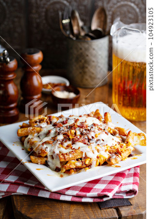 Cheese fries topped with bacon 104923105