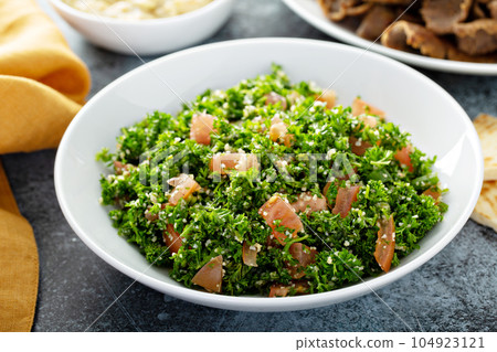 Parsley tabbouleh with tomato and cous cous 104923121