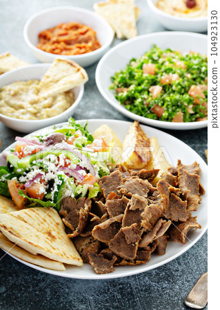 Mediterranean food on the table Mediterranean food on the table 104923130