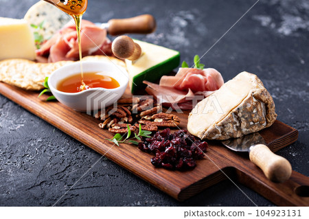 Cheese and snack board Cheese and snack board 104923131