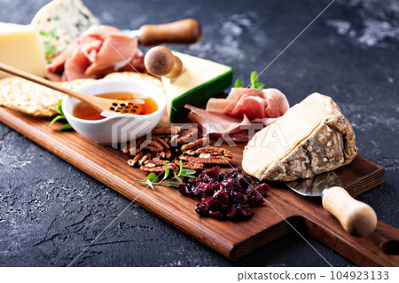Cheese and snack board Cheese and snack board 104923133