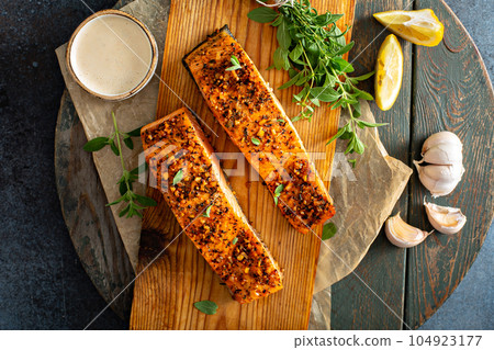 Cedar plank roasted salmon 104923177