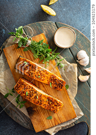 Cedar plank roasted salmon Cedar plank roasted salmon 104923179