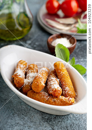 Hot mozzarella sticks 104923239