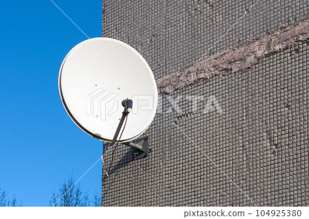satellite dish on the wall satellite dish on the wall 104925380
