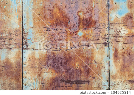 rusty metal texture background, old scratched iron wall with seams and rivets rusty metal texture background, old scratched iron wall with seams and rivets 104925514