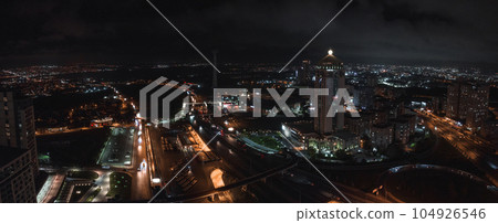 Aerial view of the Istambul business district. Rapidly developing business and finance area of Istanbul with highrises and shopping malls. Commercial buildings at night 104926546