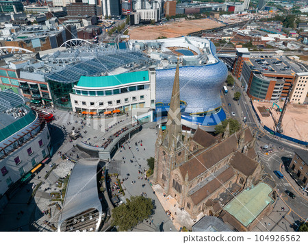 View of the skyline of Birmingham, UK including The church of St Martin, the Bullring shopping centre and the outdoor market. View of the skyline of Birmingham, UK including The church of St Martin, the Bullring shopping centre and the outdoor market. 104926562