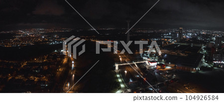 Aerial view of the Istambul business district. Rapidly developing business and finance area of Istanbul with highrises and shopping malls. Commercial buildings at night 104926584