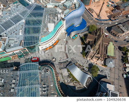 View of the skyline of Birmingham, UK including The church of St Martin, the Bullring shopping centre and the outdoor market. View of the skyline of Birmingham, UK including The church of St Martin, the Bullring shopping centre and the outdoor market. 104926636