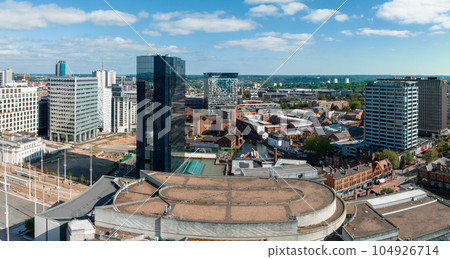 Aerial view of the eBirmingham city center. Beautiful English city, with modern skyscrapers and traditional architecture. Aerial view of the eBirmingham city center. Beautiful English city, with modern skyscrapers and traditional architecture. 104926714