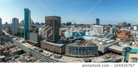 View of the skyline of Birmingham, UK including The church of St Martin, the Bullring shopping centre and the outdoor market. View of the skyline of Birmingham, UK including The church of St Martin, the Bullring shopping centre and the outdoor market. 104926767