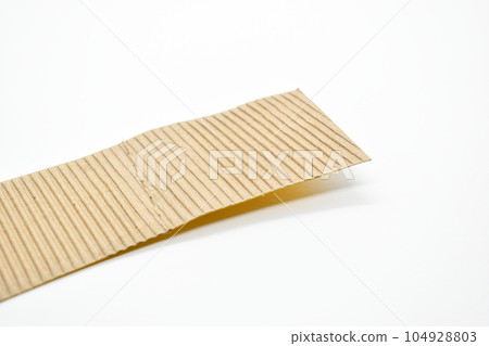 closeup brown paper cardboard texture on white background closeup brown paper cardboard texture on white background 104928803