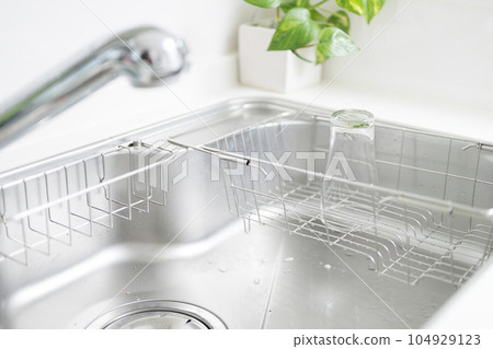 A clean and shiny kitchen sink A clean and shiny kitchen sink 104929123