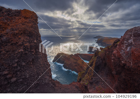 Volcanic sea cliffs of the Sao Lourenco peninsula, eastern Madeira, Portugal, Atlantic Ocean Volcanic sea cliffs of the Sao Lourenco peninsula, eastern Madeira, Portugal, Atlantic Ocean 104929196
