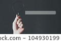 Search Engine Optimization, Search bar on virtual screen with hand holding magnifying glass. 104930199