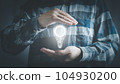 Futuristic light bulb for new idea concept with innovation and inspiration, 104930200