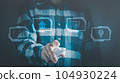 Man with remote control on smart home applications, concept of digitalization. 104930224