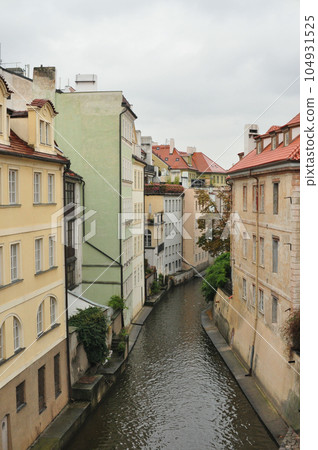 Houses at Certovka side canal of the Vltava River in Prague, Czech Republic Houses at Certovka side canal of the Vltava River in Prague, Czech Republic 104931525