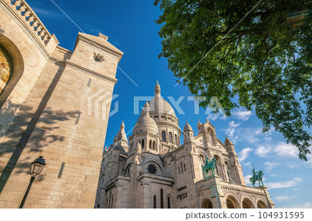 Sacre Coeur Cathedral on Montmartre Hill, Paris in France 104931595
