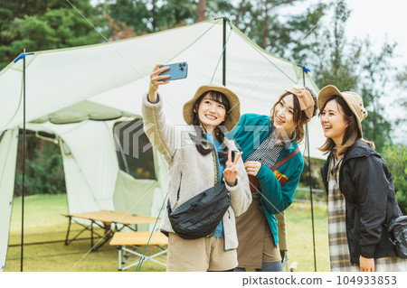 Women who came to camp at the outdoor campsite in autumn and winter (female campers, friends, Asians) Women who came to camp at the outdoor campsite in autumn and winter (female campers, friends, Asians) 104933853
