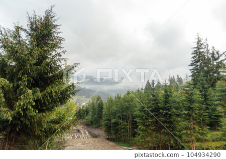 Green Ukrainian mountains. Summer time. Beautiful views of the largest peaks. 104934290