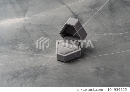 Small jewelry box on gray background close up 104934835