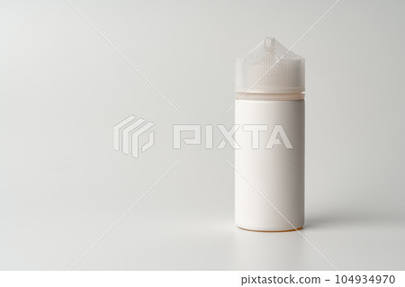 Refill liquid for electronic cigarettes on gray background Refill liquid for electronic cigarettes on gray background 104934970