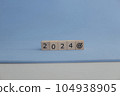 Abstract for business targen in the year 2024. Blue background. 104938905