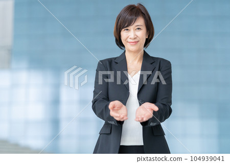Manager's middle business woman working in the office Manager's middle business woman working in the office 104939041