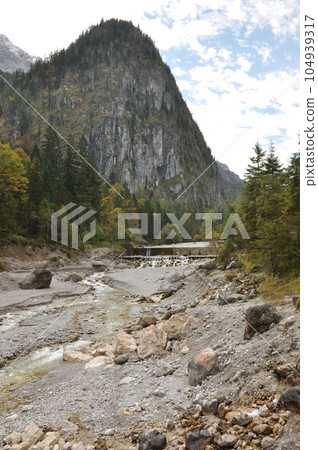 Dam stairs in the Wimbachtal in the Berchtesgadenerland, Bavaria, Germany Dam stairs in the Wimbachtal in the Berchtesgadenerland, Bavaria, Germany 104939317