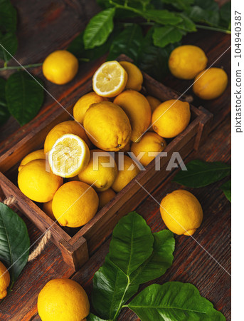 Fresh lemons in crate Fresh lemons in crate 104940387