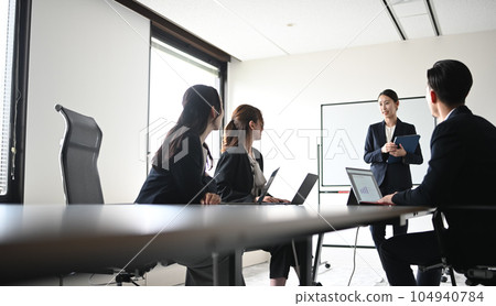Business person during the meeting 104940784