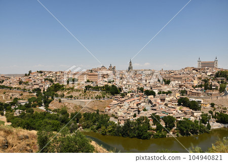 Scenic view of the river and old town of Toledo, Spain on a sunny day Scenic view of the river and old town of Toledo, Spain on a sunny day 104940821